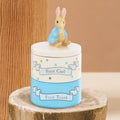 Peter Rabbit ceramic first tooth and first curl stacking keepsake box set in cream and blue with Peter Rabbit figurine lid topper, on white background